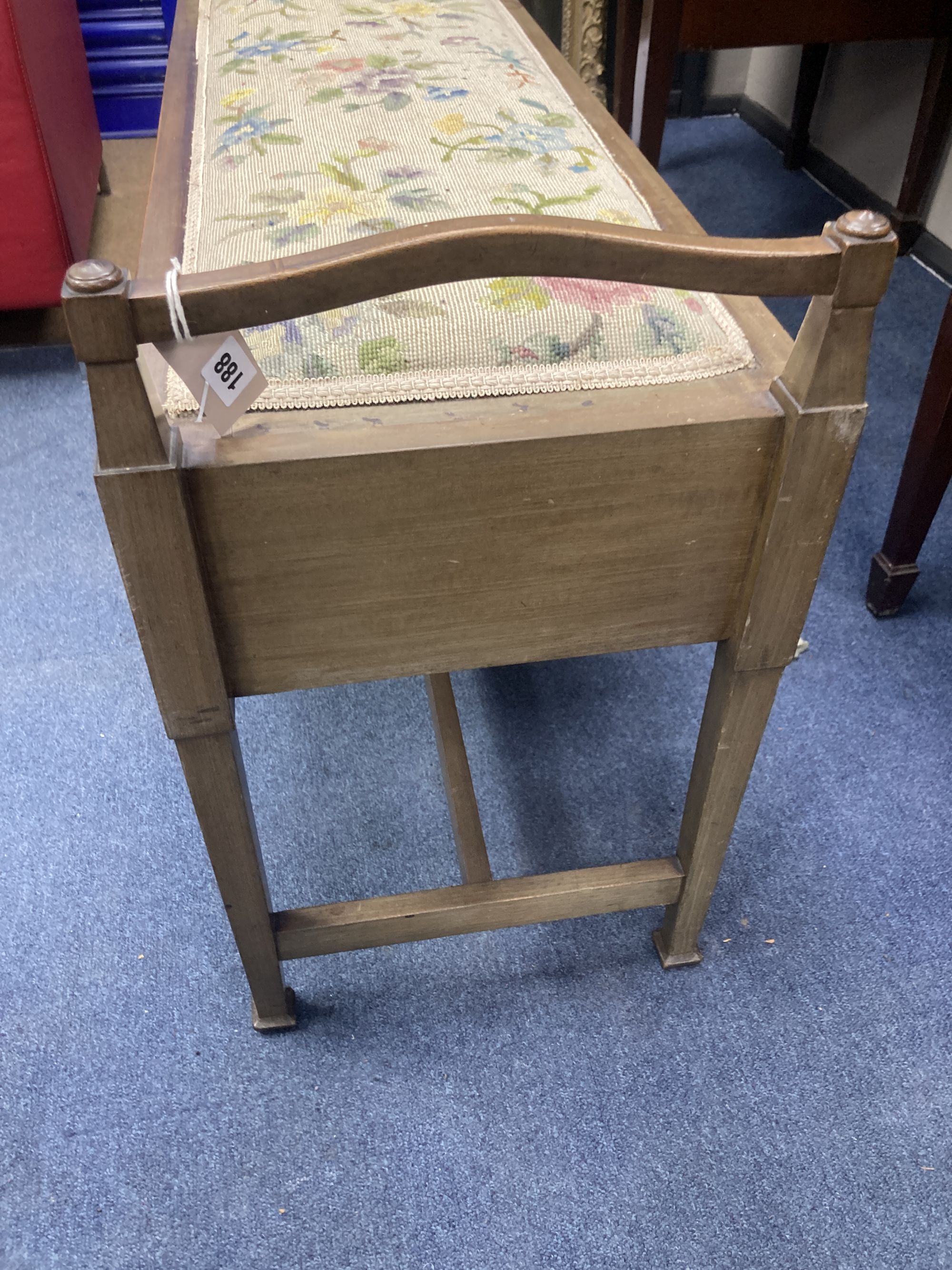 An Edwardian mahogany box seat duet piano stool, width 97cm, depth 36cm, height 61cm